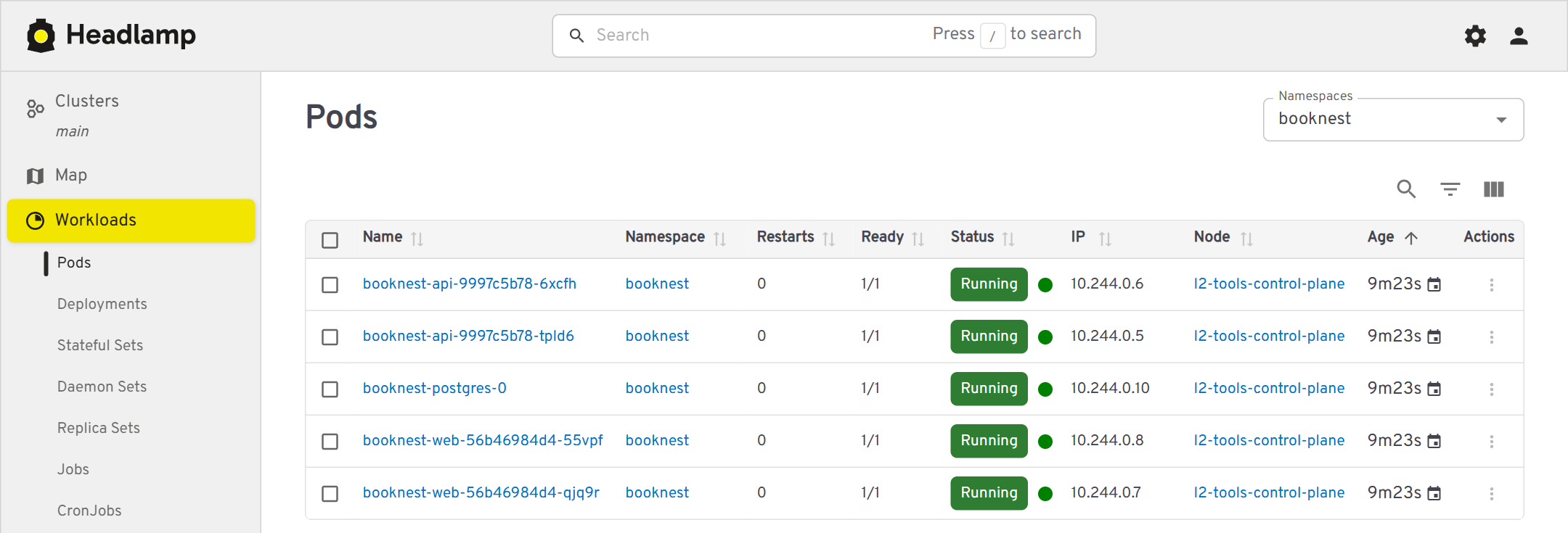 Headlamp 0.45.0 in the l2-tools cluster, logged in with the viewer token: BookNest's five Pods (headless Chrome on the Windows host)